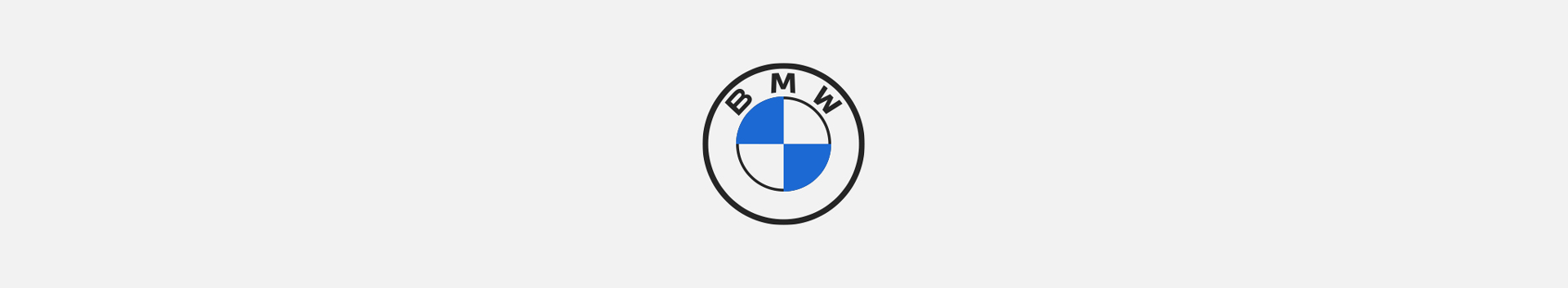 BMW roundel logo in black and blue on top of a BMW-lite-grey background.
